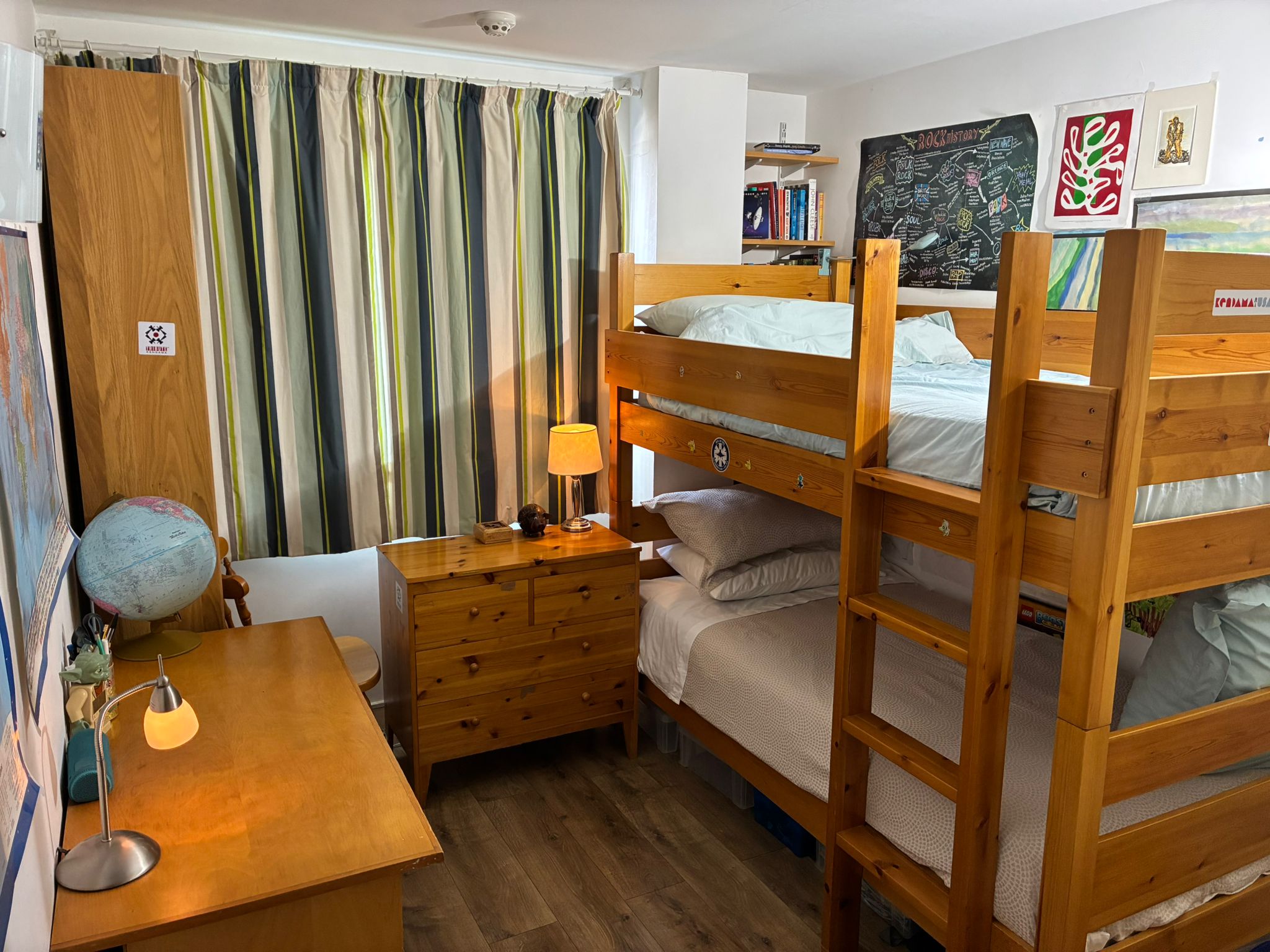 Bunk bed room with warm lamp light