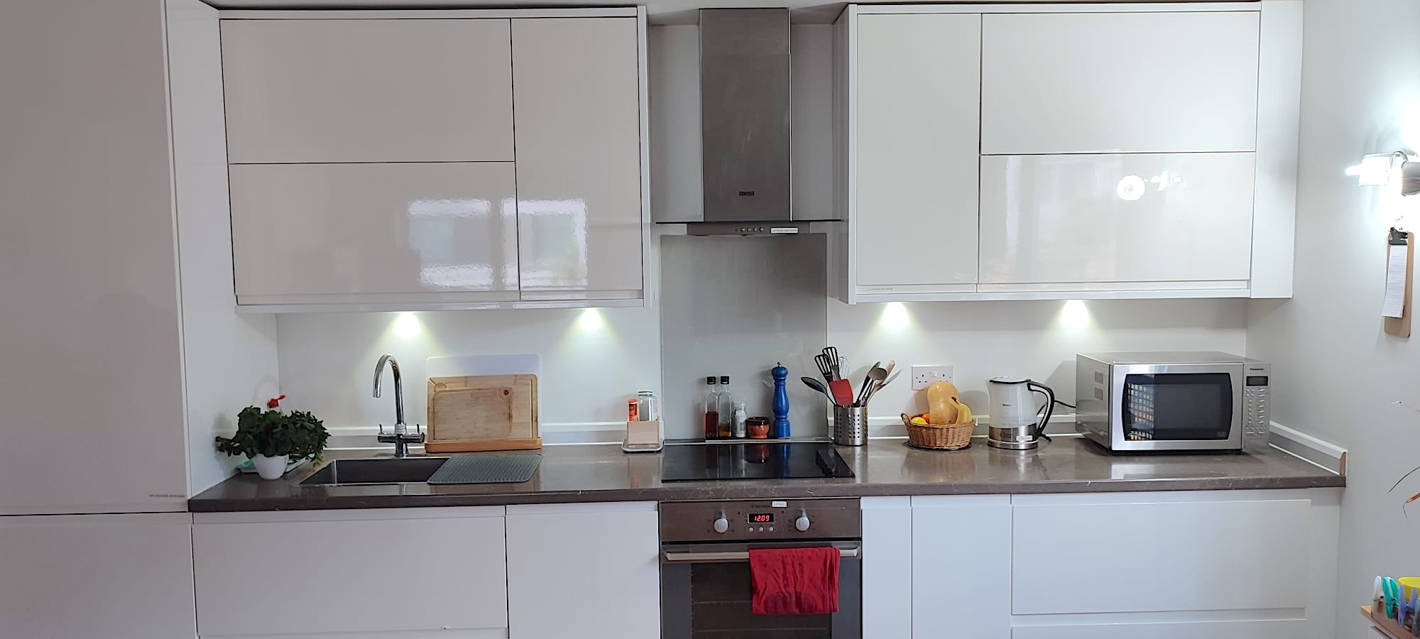 Clean kitchen with under-cabinet lighting